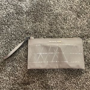 Gray and silver Michael Kors wristlet/wallet